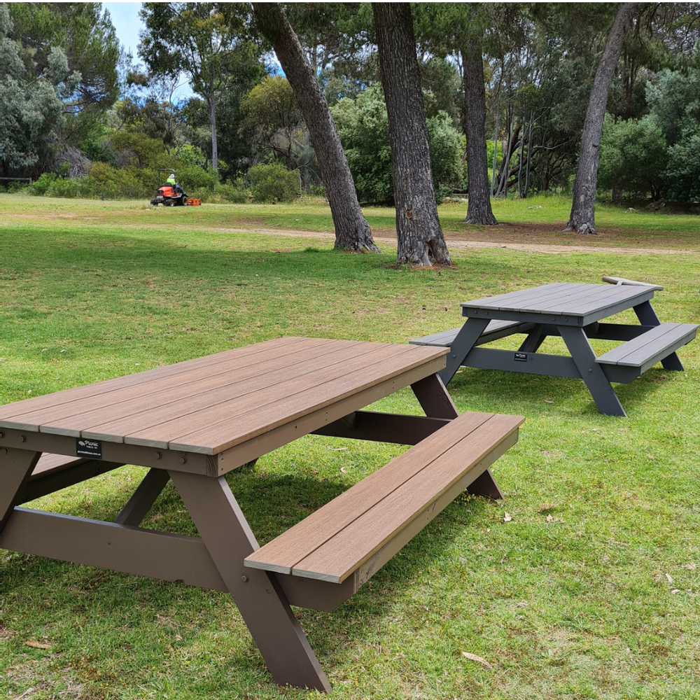 Traditional picnic tables in park setting