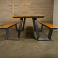 W shape steel picnic table with composite timber top.