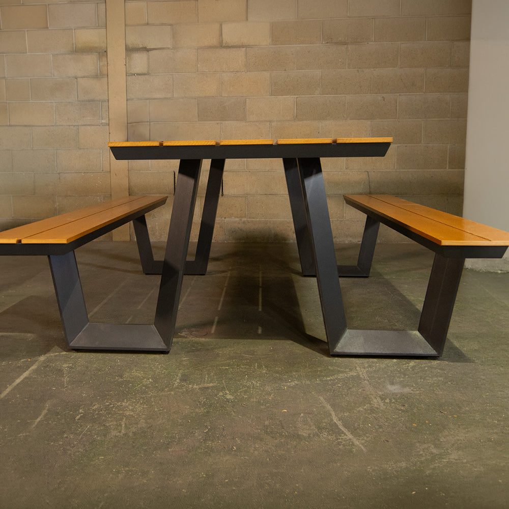 W shape steel picnic table with composite timber top.